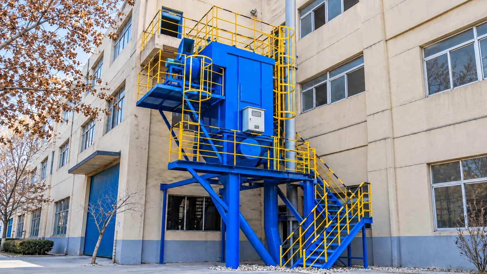 HMC series pulse-jet baghouse dust collector with service platforms and access stairs